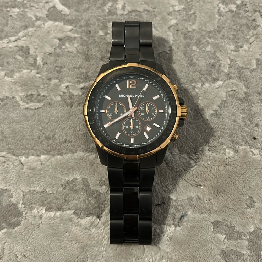 Micheal Kors grey and gold men’s watch. Great condition